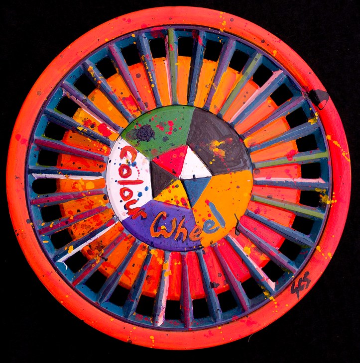 276 Colour Wheel. Acrylic on Hub Cap by Yvonne Callaway Smith.